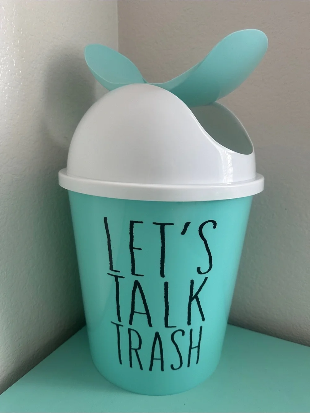 Essential Home Designs-basic plastic trash can with swinging top-new